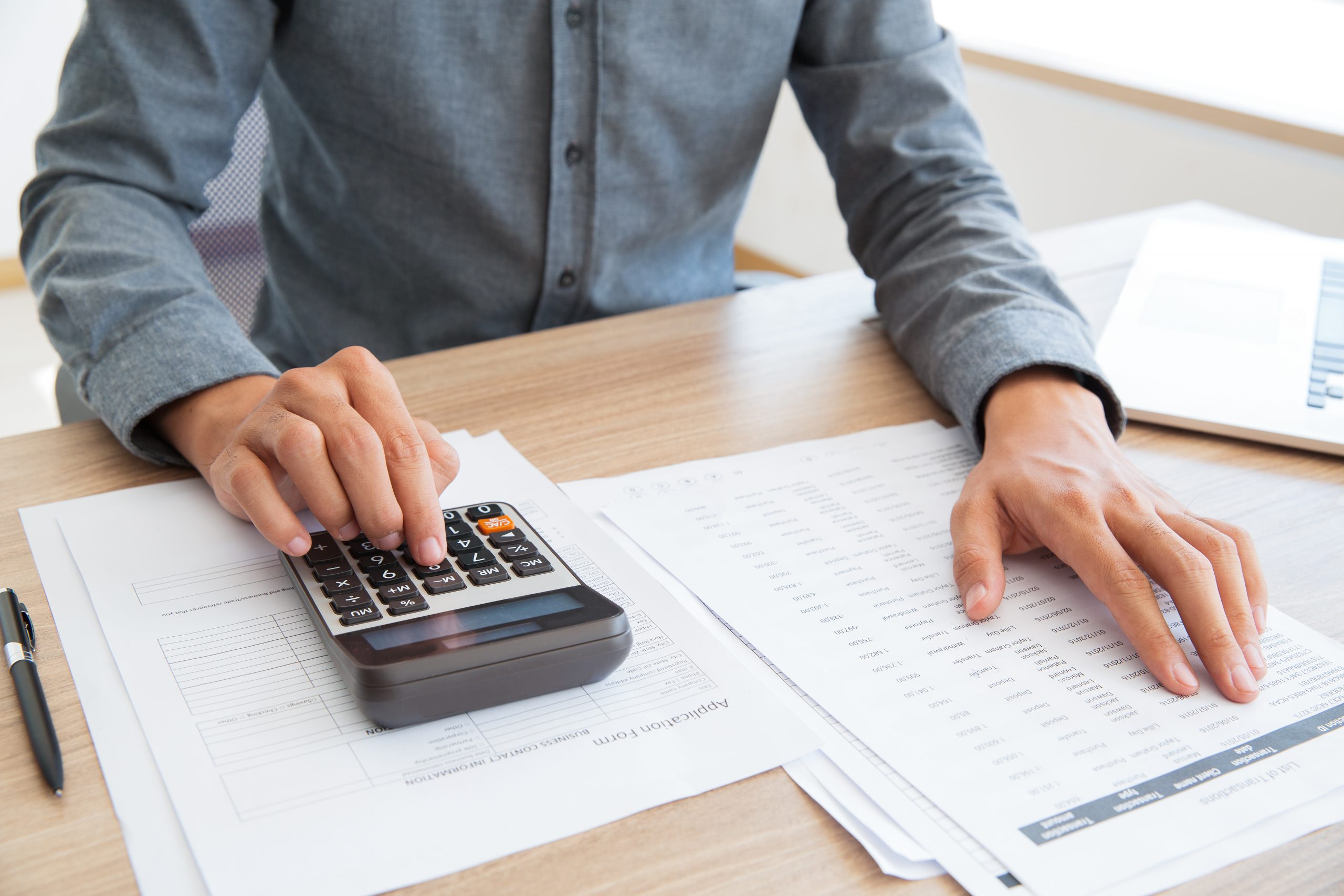 Calculating company tax and examining report